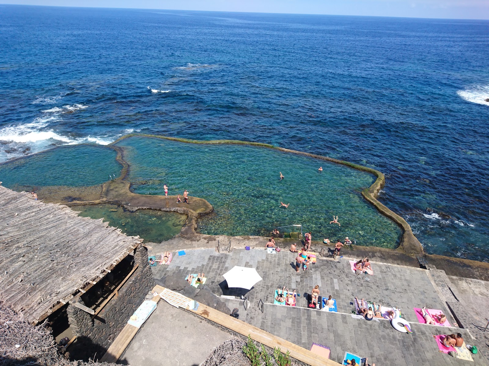 Photo of Natural Pool La Maceta with concrete cover surface