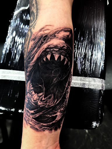 Explore rose tattoo ideas forearm, creative tattoo ideas in Saint Paul, available at Supreme Art Of War Inc