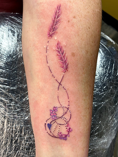 Explore men hand tattoo ideas, creative tattoo ideas in Warner Robins, available at Untold Pain Tattoo Studio