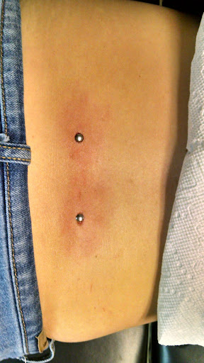 Explore lion and lamb tattoo ideas, creative tattoo ideas in Dillon, available at Stuck On You Body Piercing