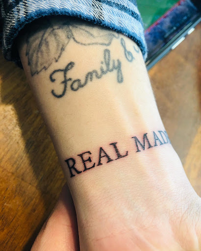 Explore floral tattoo cover up ideas, creative tattoo ideas in North Tonawanda, available at Dark Side Ink Tattoo Studio