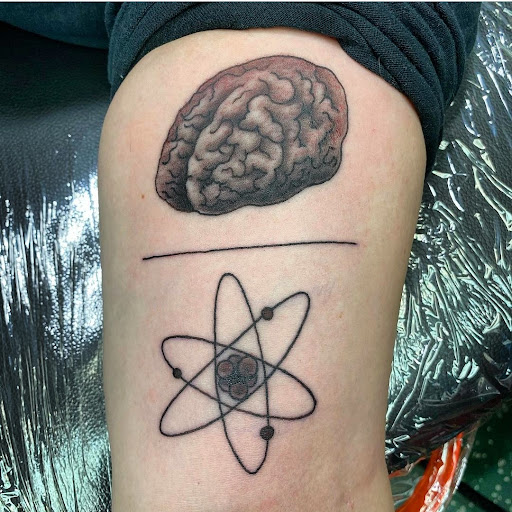 Explore cover up tattoo ideas for upper arm, creative tattoo ideas in Vancouver, available at Studio X Tattoos & Piercings