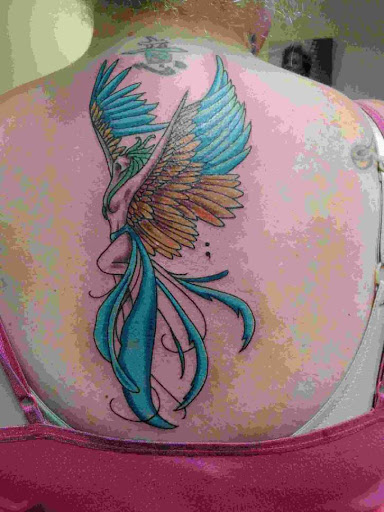 Explore purple tattoo ideas, creative tattoo ideas in Fort Dodge, available at Black Diamond Tattoo Studio