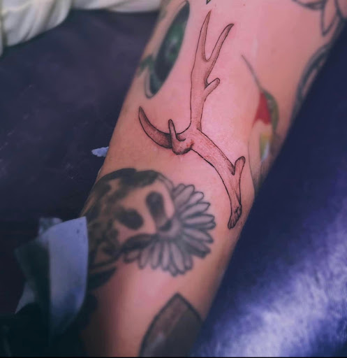 Explore thigh flower tattoo ideas, creative tattoo ideas in Lavonia, available at New Moon Tattoo LLC
