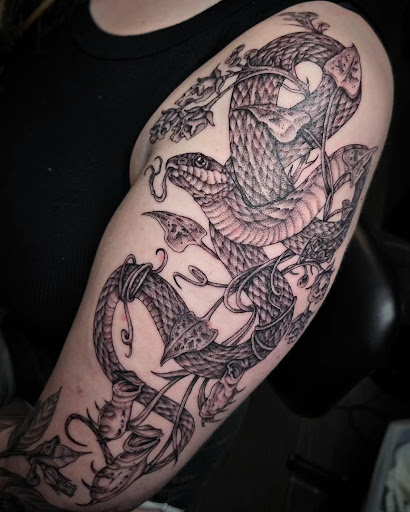 Explore tattoo family tree ideas, creative tattoo ideas in Palm Harbor, available at Angry Owl Tattoo and Piercing