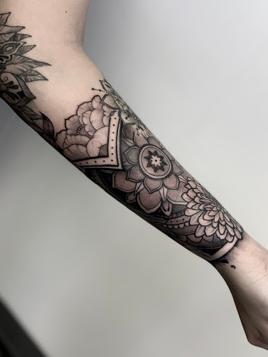 Explore rose tattoo ideas for females, creative tattoo ideas in Springfield, available at Triumph Tattoo