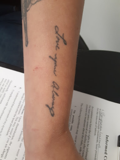 Explore word tattoo ideas for men, creative tattoo ideas in Saint Paul, available at Fearless Tattoo Removal