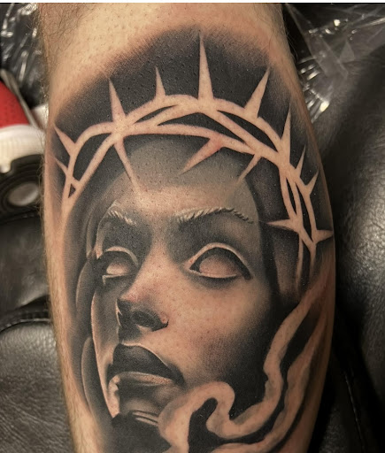 Explore tattoo cover up ideas for men, creative tattoo ideas in Wisconsin Dells, available at Twisted Dimensions Tattoo Studio