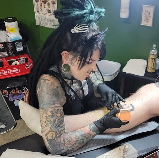 Find dragon tattoo ideas male for your next unique tattoo in Bloomington at Crystal Moon Body Arts