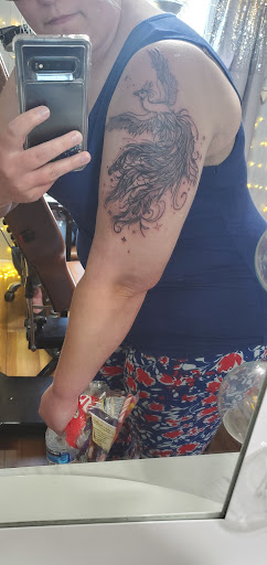 Explore tattoo ideas strong woman, creative tattoo ideas in Greenwood, available at Salty Siren Tattoo Lounge