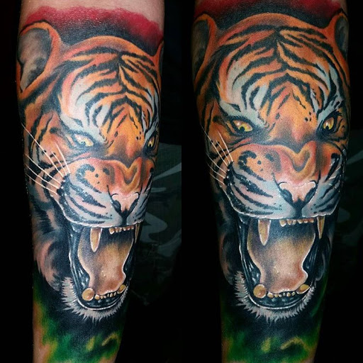 Explore the amity affliction tattoo ideas, creative tattoo ideas in Bloomfield, available at Tattoo Garage