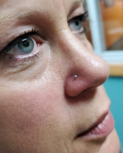 Tattoo Shop «Skin of A Different Color», reviews and photos, 2080 E New York St, Aurora, IL 60502, USA