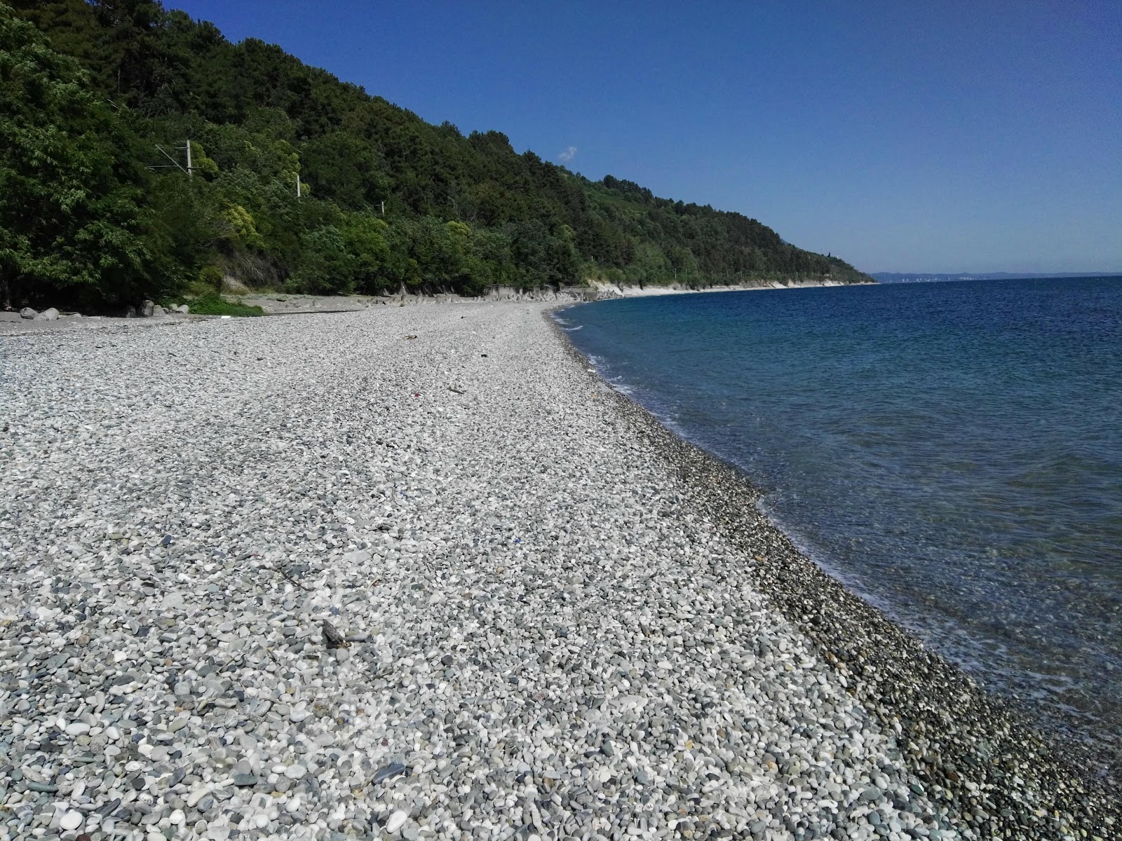 Foto van Solnechnyi beach met lichte kiezelsteen oppervlakte