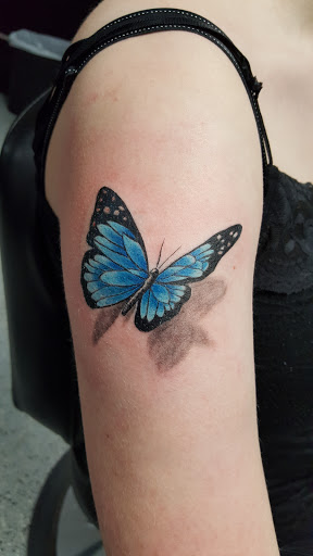 Explore mens back tattoo ideas, creative tattoo ideas in Wichita, available at Body Canvas Tattooing