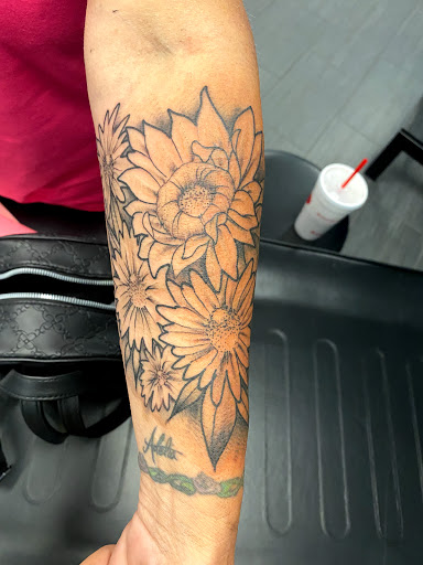 Find best tattoo ideas for wrist for your next unique tattoo in Palm Harbor at Angry Owl Tattoo and Piercing