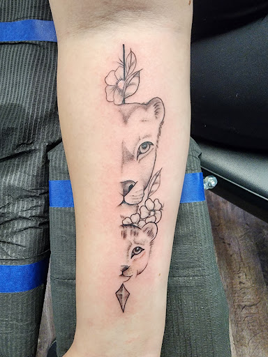 Explore family tree tattoo idea, creative tattoo ideas in Muscatine, available at The Sapphire Lounge