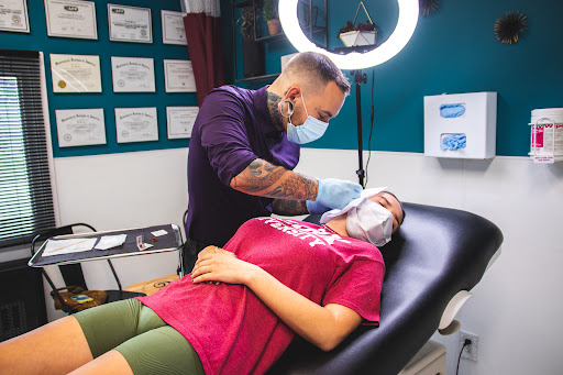 Explore snake tattoo ideas for guys, creative tattoo ideas in Worcester, available at Elegance Piercing & Tattoo Inc.