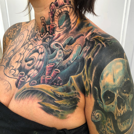 Explore men's back tattoos ideas, creative tattoo ideas in Saint Petersburg, available at Cthulhu Tattoo & Body Piercing