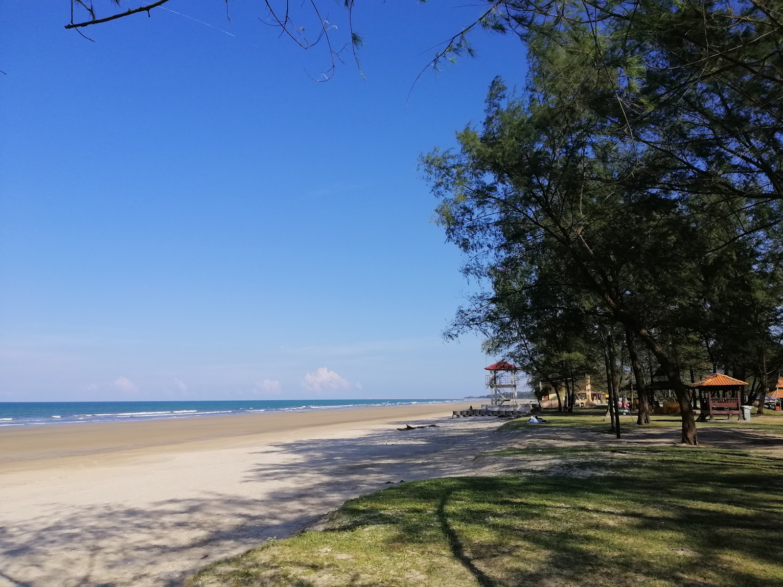 Photo de Lagenda Beach avec sable lumineux de surface