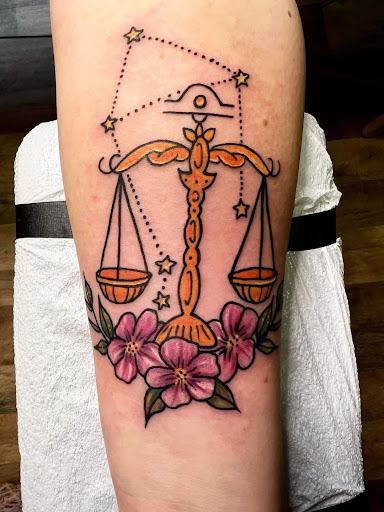 Explore cute behind the ear tattoo ideas, creative tattoo ideas in Adrian, available at Good Life Tattoo Co.