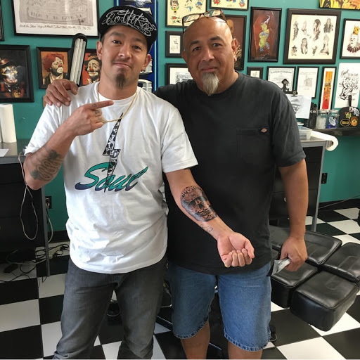 Explore colour tattoo sleeve ideas, creative tattoo ideas in Norwalk, available at Norwalk Tattoo Studio