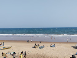 Photo de Markandi Beach avec rivage droit, long