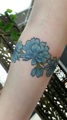 Explore maltese cross tattoo ideas, creative tattoo ideas in Tecumseh, available at Lucid Tattoo Gallery