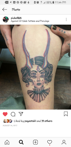 Explore small tattoo ideas behind ear, creative tattoo ideas in Powell, available at Against All Odds Tattoos and Piercings