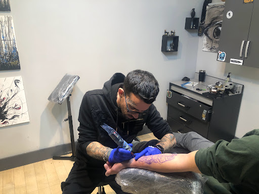 Explore gravestone tattoo ideas, creative tattoo ideas in Fort Wayne, available at Grade A Tattoos and Body Piercing