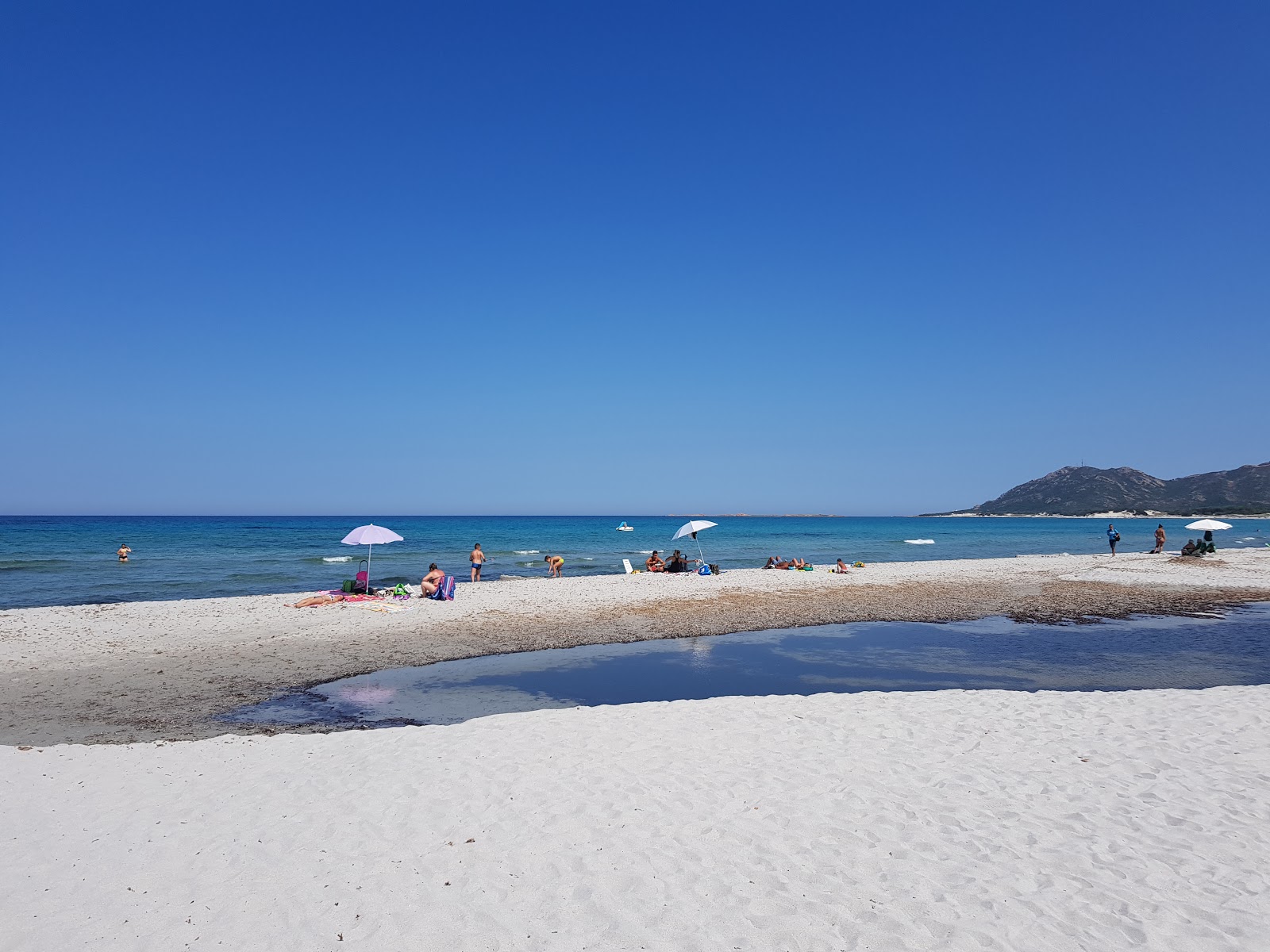 Photo de Plage de Capo Comino N avec un niveau de propreté de très propre