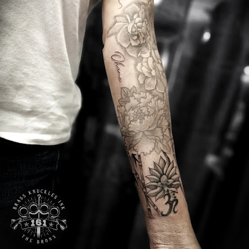 Explore leg tattoo ideas for men black, creative tattoo ideas in Bronx, available at Brass Knuckles Ink Tattoo Studio