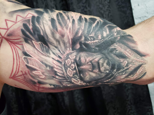 Explore ichigo tattoo ideas, creative tattoo ideas in Mebane, available at The Cardinal Skin Art & Gallery