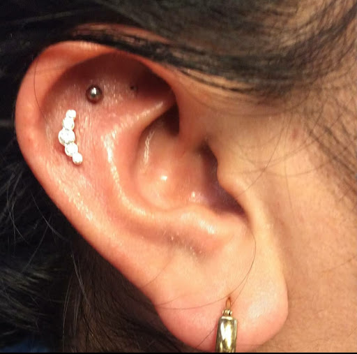 Find tattoo ideas 2023 female for your next unique tattoo in Raleigh at The Room Body Piercing Studio