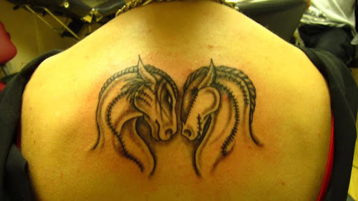 Find gay tattoo ideas for guys for your next unique tattoo in Waynesboro at Extreme Expressions