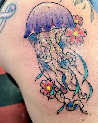 Explore tulip tattoo ideas, creative tattoo ideas in Modesto, available at The Golden Rose Tattoo