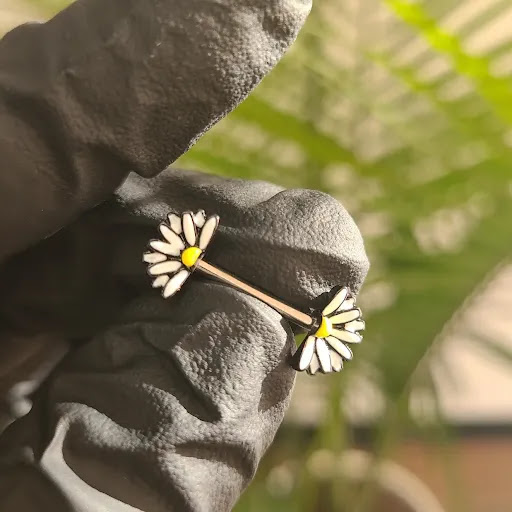 Explore rose tattoo cover up ideas, creative tattoo ideas in Nacogdoches, available at Primal Piercing & Jewelry