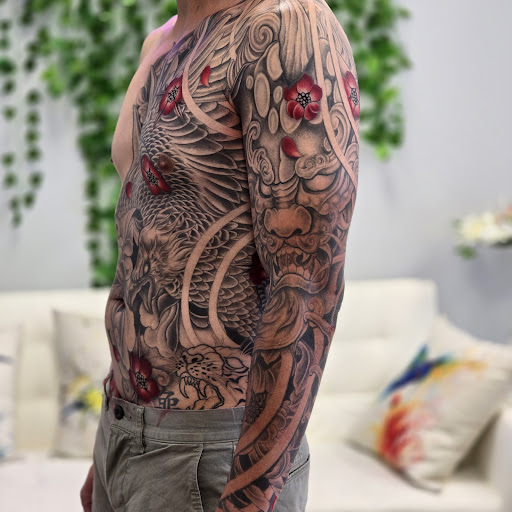 Explore neck tattoo ideas for women, creative tattoo ideas in Garland, available at Infamous Art Studio