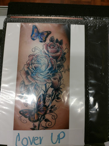 Find garter belt tattoo ideas for your next unique tattoo in Pittsburgh at Never Ending ink