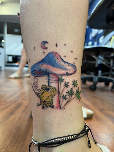 Explore leo sleeve tattoo ideas, creative tattoo ideas in Cocoa, available at Rorschach Tattoo Shop and Piercing Studio