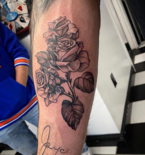 Explore script tattoo ideas for men, creative tattoo ideas in Bogota, available at Lolas Tattoo Shop