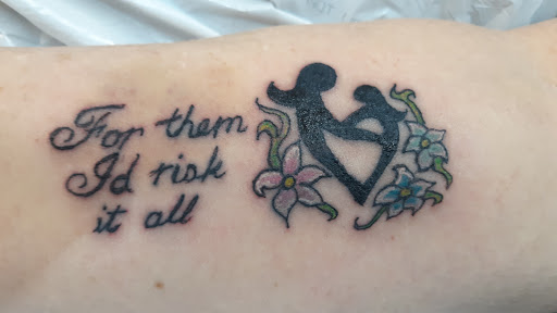 Find introvert tattoo ideas for your next unique tattoo in San Angelo at Alchemy Tattoo and Piercing Studio