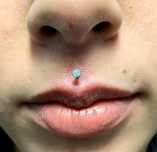 Explore wine glass tattoo ideas, creative tattoo ideas in Summerville, available at Exotic Impressions Body Piercing