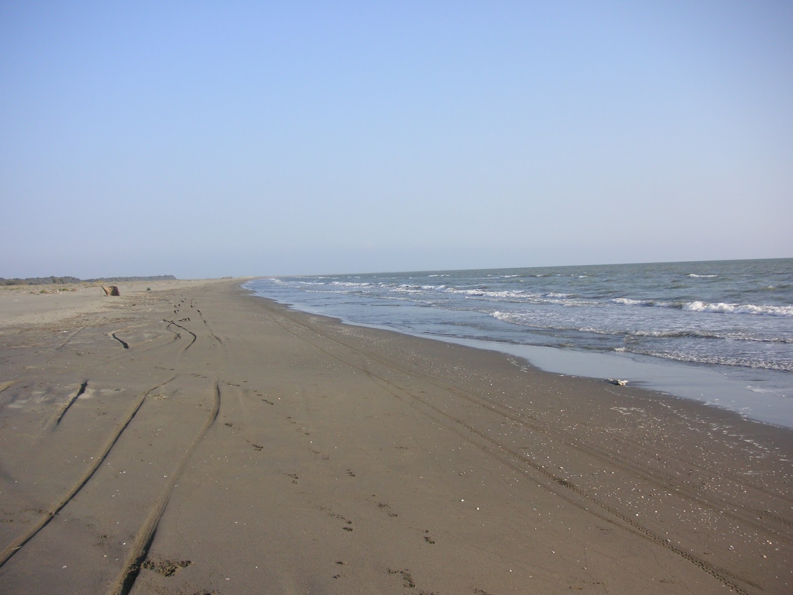 Foto van Tarsus beach met turquoise water oppervlakte