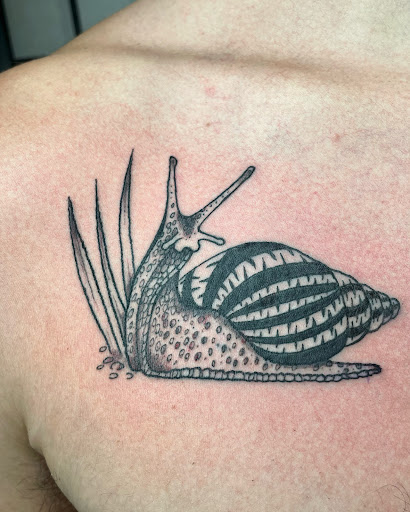 Explore gas mask tattoo ideas, creative tattoo ideas in Barre, available at HINTERLAND TATTOO