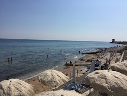 Foto von Torre Calderina beach mit lange, gerade küste