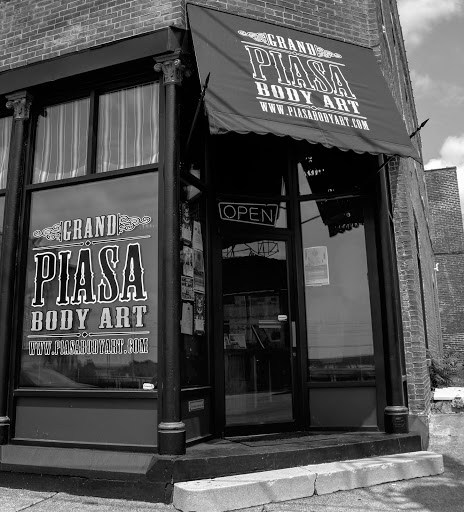 Explore nike tattoo ideas, creative tattoo ideas in Alton, available at Grand Piasa Body Art