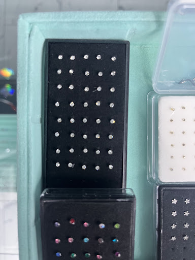 Find ouija board tattoo ideas for your next unique tattoo in Bloomfield at Bad Intentionz Tattoo Studio