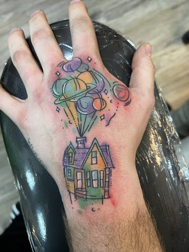 Explore adoption tattoo ideas, creative tattoo ideas in Spokane, available at Mystery Ink Tattoo