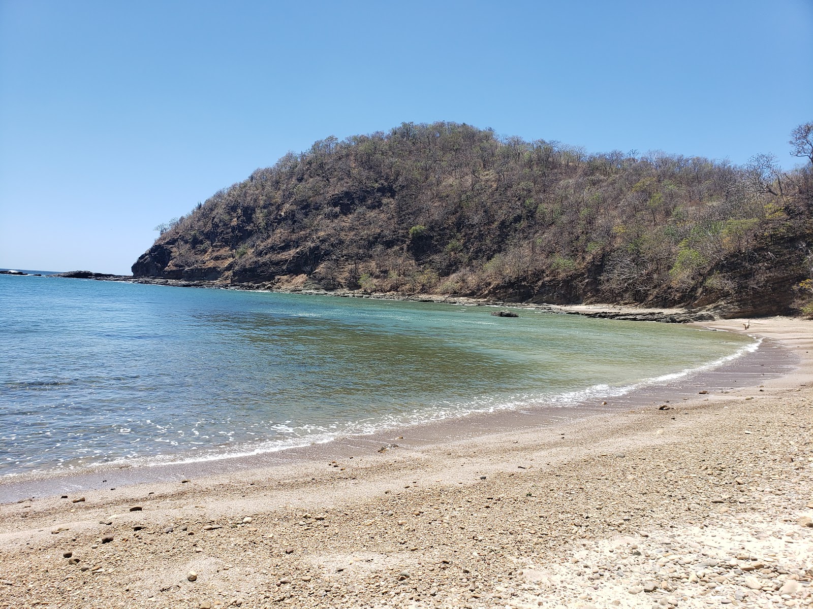 Foto av Strand Pena Rota med turkos rent vatten yta