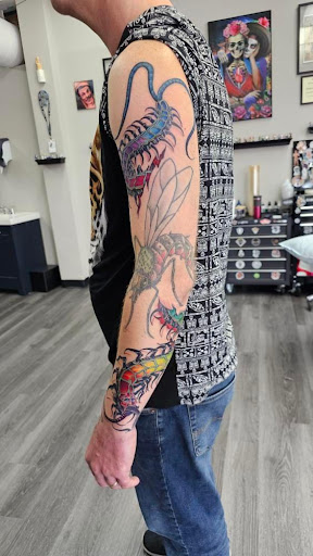 Explore black mamba tattoo ideas, creative tattoo ideas in Saint Paul, available at Olmeca Tattoo